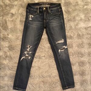 American Eagle Outfitters Skinny Blue Jeans with Distressed Design low rise